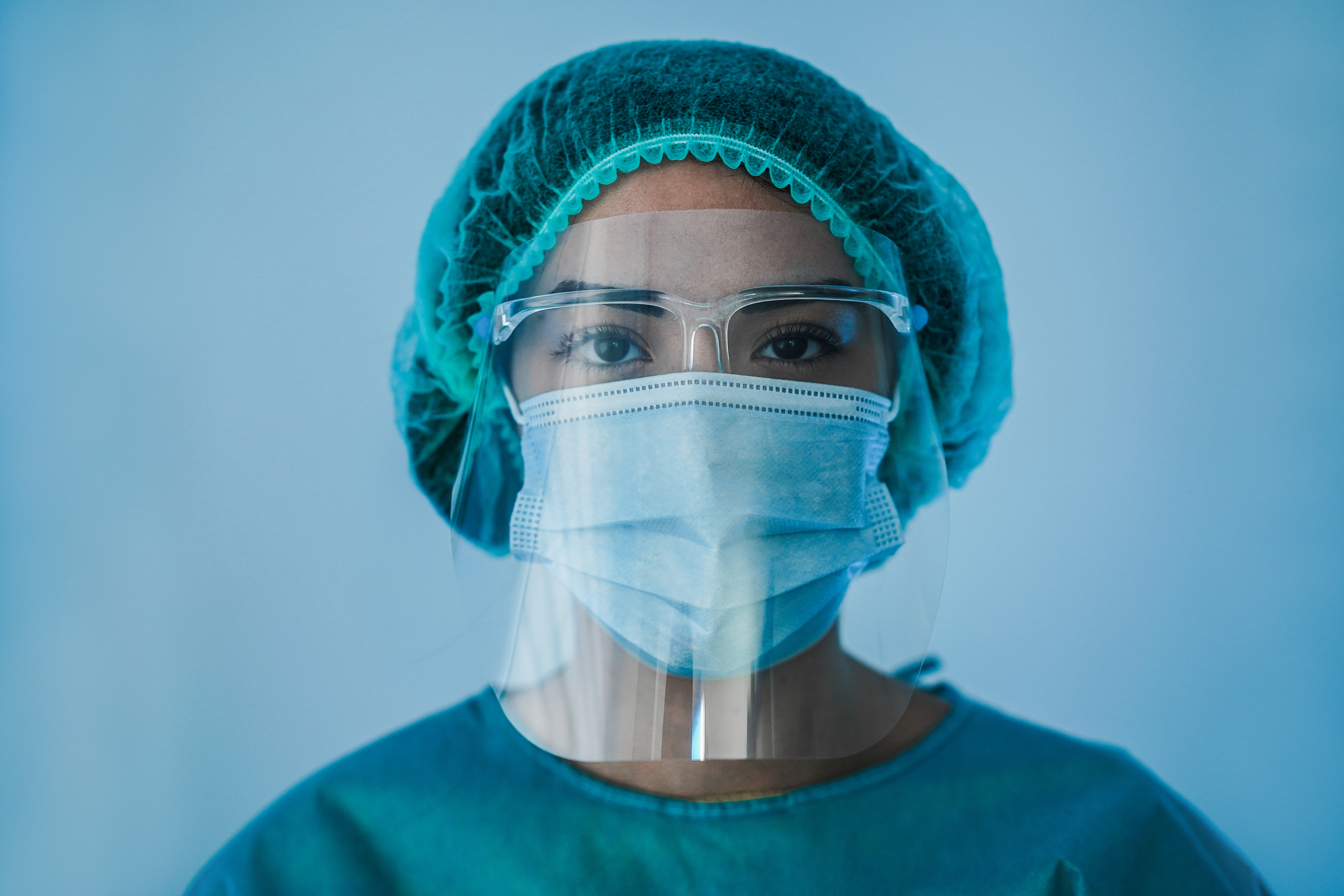 Photo representing a nurse wearing PPEs